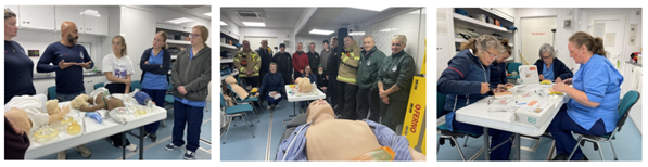 A group of people standing around a dummy

AI-generated content may be incorrect.